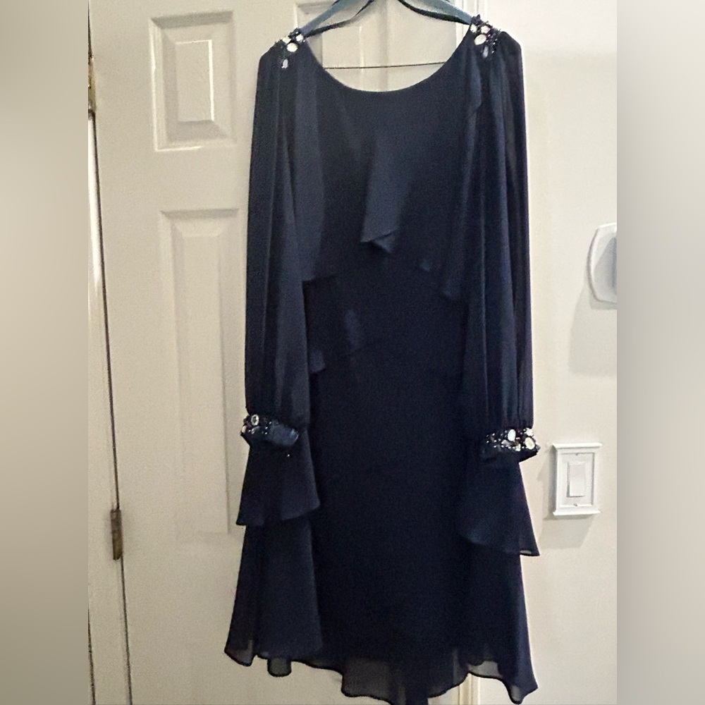 Black long sleeve evening dress.